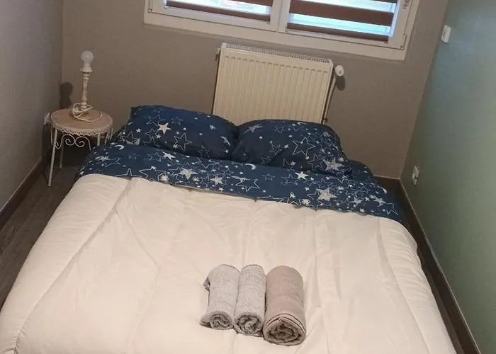 Maison En